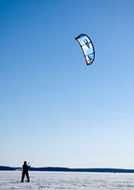 Kite boader with a big kite